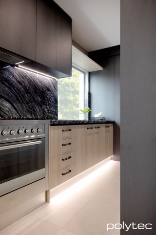 polytec MELAMINE - Cabinetry in Empire Oak Woodmatt,  and Casentino Beech Woodmatt.