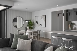 polytec KITCHEN - Doors and panels in Black Ply Woodmatt, Wall lining in Channel 25.