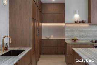 polytec KITCHEN - Doors and panels in Florentine Walnut Woodmatt.