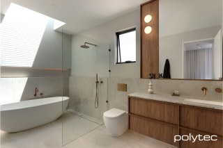 polytec BATHROOM - Drawers and panels in Florentine Walnut Woodmatt.