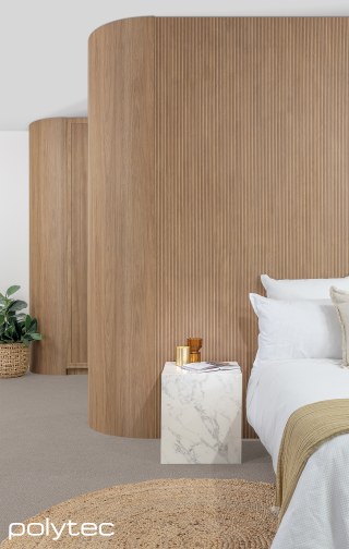 polytec WARDROBE - Wall lining in Batten Oak Woodmatt,  and Prime Oak Woodmatt, Bedside table in Marmo di Monte Smooth, Wardrobe doors in Sussex,  with Prime Oak Woodmatt,  and Batten Oak Woodmatt.