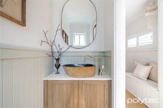 polytec BATHROOM - Surano 18mm doors in Prime Oak Woodmatt, Xenolith vanity benchtop in Marmo di Torre Smooth.
