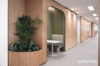 polytec COMMERCIAL & ARCHITECTURAL - Wall panels, planter and seating in Tasmanian Oak Woodmatt.