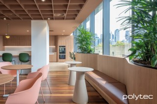 polytec COMMERCIAL & ARCHITECTURAL - Doors, seating and cafe tops in Tasmanian Oak Woodmatt, Cafe tops in Portland Stone Smooth.
