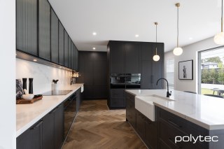 polytec KITCHEN - Doors & panels in Hampton,  with Tempest Woodgrain, Overhead doors in 23mm Brushed Black Frame,  with Fluted Glass Insert.