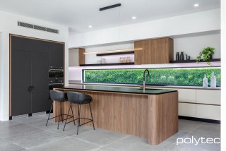 polytec KITCHEN - Doors in Black Venette, Island and Overhead panels in Notaio Walnut Woodmatt, Drawers	 in Bespoke Legato,  with Bevel Edge.