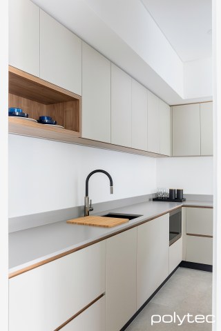 Polytec - Doors and drawers	 in Bespoke Legato,  with Bevel Edge, Open shelf and fingerpull rails in Notaio Walnut Woodmatt.