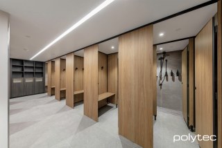 polytec COMMERCIAL & ARCHITECTURAL - Partition Systems in Prime Oak Woodmatt, Shelving and laundry fronts in Bottega Oak Woodmatt.