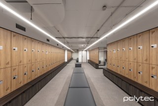 polytec COMMERCIAL & ARCHITECTURAL - Partition Systems in Prime Oak Woodmatt, Shelving and laundry fronts in Bottega Oak Woodmatt, Lockers in Prime Oak Woodmatt,  and Bottega Oak Woodmatt.