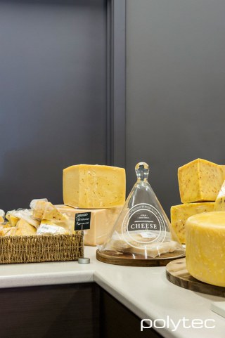 Polytec - Laminate benchtop in Pearl Fabrini Matt, Melamine panels in Truffle Lini Matt.