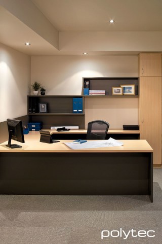 polytec COMMERCIAL & ARCHITECTURAL - Melamine desktop and drawers in Tuross Oak Matt, Melamine open shelving in Graphite Matt.