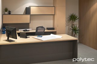 polytec COMMERCIAL & ARCHITECTURAL - Melamine shelving and screening in Graphite Matt, Melamine desktop and doors in Tuross Oak Matt.