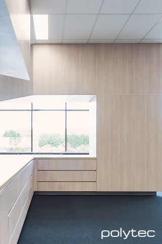 polytec COMMERCIAL & ARCHITECTURAL - Drawers and panels in Soft Walnut Ravine.