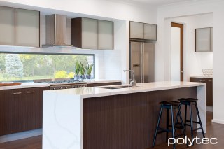 Polytec - Overhead doors in Frosted glass insert.