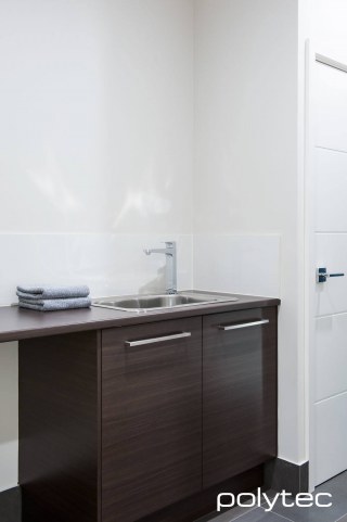 polytec LAUNDRY - Melamine doors in Belgian Oak Matt, Laminate benchtop in Belgian Oak Matt.