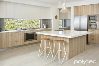Polytec - Door, drawers and panels in Natural Oak Ravine, Melamine overhead cupboards in Classic White Matt.