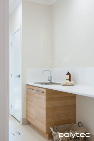 polytec LAUNDRY - Doors in Natural Oak Ravine, Laminate benchtop in Classic White Matt.