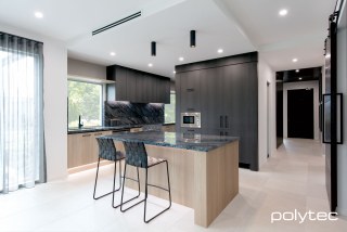 polytec MELAMINE - Cabinetry in Empire Oak Woodmatt,  and Casentino Beech Woodmatt.